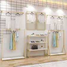 Maybe you would like to learn more about one of these? Modern Clothing Display Racks Customized Metal Garment Rack Clothes Store Interior Design Rustic Boutique Used Clothes Racks For Showroom Gold Black Buy Online In Guernsey At Guernsey Desertcart Com Productid 131080246