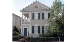 The exterior is where the charm starts with its trio of gables and a large front covered porch. Anson Park Building Science Associates Southern Living House Plans