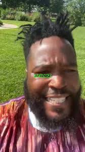 Dr Umar Johnson Green Shirt