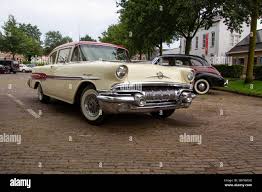 Image result for Starlight Yellow 1957 Pontiac