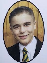 Mum's tribute to 12-year-old son killed after falling through factory roof  as hundreds gather for memorial football match