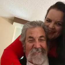 Can someone edit out the person walking behind the fence?