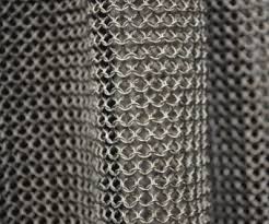 Chain mail is a type of armour consisting of small metal rings linked together in a pattern to form a mesh. Ringmesh Chainmail At Its Finest