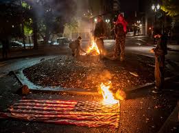 Protesters Set American Flags On Fire As Us Election Results Roll In The Independent