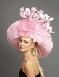 A derby superfan sends a message with her hat. Baby Pink Derby Hat Couture Derby Hat Kentucky Derby Hats Etsy