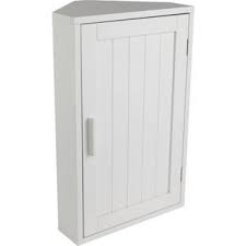 Towels are tucked away in a cabinet with a. White Wooden Corner Bathroom Cabinet Homebase White Bathroom Cabinets White Bathroom Furniture Bathroom Corner Storage Cabinet