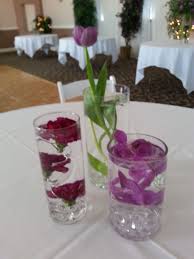 Submerged Carnations Orchids And Tulip Centerpieces Tulip Centerpiece Table Decorations Glass Vase