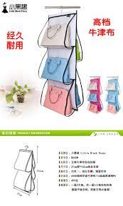 正品小黑裙高档牛津纺布艺皮包包收纳挂袋衣柜橱收纳袋多层挂包袋 淘宝网 little black dress product information black dress