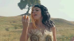 What kind of tattoo does melanie martinez have? Melanie Martinez Drawing Orange Juice Novocom Top