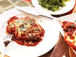 Garlic cloves slip right out of their papery skin with a good whack from the broad side of a knife. For The Best Chicken Parmesan Take A Lesson From The South The Food Lab Serious Eats