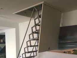 Roof hatch with scissor stairs combination. Scissor Stairs A Sturdy And Innovative Access System Architecture Design