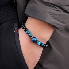 It has been used for hundreds of years due to its mysterious appearance and metaphysical powers. Blue Tigers Eye And Labradorite Beads Bracelet Mens Beaded Bracelet Jewelry Kolhergroup Handmade Products