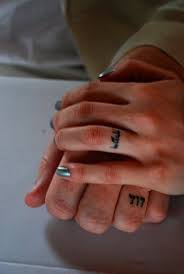 Pin By Meg Stoddard On Ink Ring Tattoos Finger Tattoos Tattoo Wedding Rings