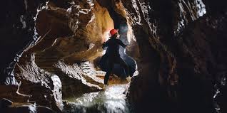 Black water abyss is mostly composed of actors breathing heavily in studio tanks while torches bounce off dampened sets. Waitomo Caves Black Abyss Ultimate Caving Experience Getyourguide