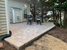 We had a raised paver patio installed this summer with a boulder retaining wall. Raised Paver Patio Outdoor Living Tip Of The Day Mr Outdoor Living