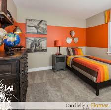 I Like This Light Carpet Dark Furniture And The Large Stripe Of Orange It S Enough Without Being Overbearing W Boys Room Colors Boy Room Paint Boys Room Blue