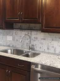 The second popular cabinet color is white for brown granite countertops. White Glass Metal Modern Backsplash Tile For Contemporary To Modern Projects