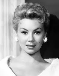 Making supper with Misty Ayers, 1955, who appeared in the nudie films A  Night in Hollywood (1953), Tjuana After Midnite (1954), and Bad Girls Do  Cry (1965).