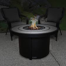If you prefer fire pits to patio heaters, our top pick is a model that can be run on propane or fitted out this natural stone propane campfire pit from best choice products has a round fire bowl with a stainless steel burner and a decorative rock base. Sunbeam Round Ceramic Top Aluminum Propane Natural Gas Fire Table Reviews Wayfair