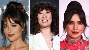 This is great for people who want volume, but don't want to deal with the full thickness of their hair. Curtain Bangs How To Style Them And How To Grow Them Out Allure