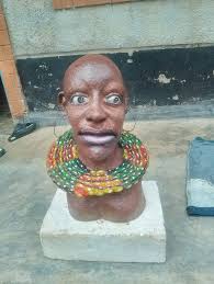 A papier mache woman portrait