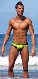 Looks like he likes seeing men in speedos. Bulging Speedo