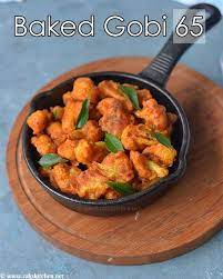 Baked Gobi 65 Recipe Indian Style Baked Cauliflower Raks Kitchen Recipe Indian Food Recipes Recipes Califlower Recipes