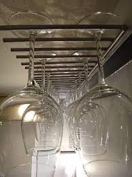 A wine rack isn't just practical storage. Turn A Trivet Into A Stylish Wine Glass Rack Ikea Hackers Wine Glass Storage Wine Glass Holder Diy Diy Wine Glass Rack