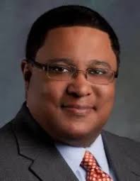 Jonathan T. Swain, President and Principal of Kimbark Beverage Shoppe;  Commissioner