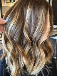 Warm blonde highlights in brown hair. 29 Brown Hair With Blonde Highlights Looks And Ideas Southern Living