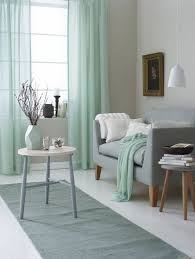 Metal suitcase with side and front carry handles which are useful for small storage in your living room, £69. 37 Green And Grey Living Room Decor Ideas Digsdigs