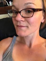 Great Pyrenees dog drinking water after brushing