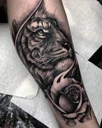 15 Best Tiger And Rose Tattoo Designs Petpress Tiger Tattoo Tiger And Rose Tattoo Rose Tattoos For Women