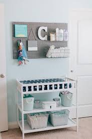Calvin S Modern Blue And Gray Nursery Project Nursery Baby Storage Baby Changing Table Baby Room Organization