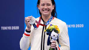 Silver medalist hong kong's siobhan bernadette haughey poses with her medal on the podium after the final of the women's 200m freestyle swimming event during the tokyo 2020 olympic games at the. C8nhpgpcj8i3 M