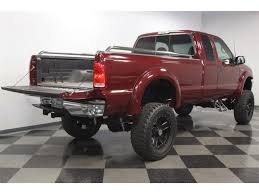 Image result for Dark Toreador Red 2000 F250