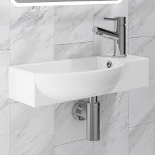 Wall mounted basins are a very good option if space is at a premium in an ensuite or cloakroom… Jupiter 500mm Curved Bathroom Toilet Basin Sink Wall Hung Countertop Ceramic 1 Tap Hole Artb02