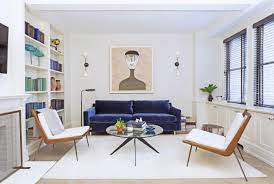A Small Space In New York Gets A Major Makeover Apartment Wall Decor Blue Living Room Apartment Living Room