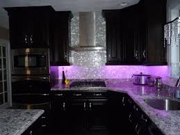 Luxurious And Glamourous Kitchen Idea With Shiny Purple Ambiance Glowing Silver Toned Backsplash Black Painted Purple Home Decor Purple Kitchen Gothic Kitchen