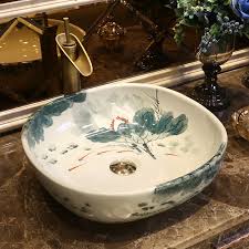 artistic bathroom sink countertop hand