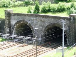 Implications have been marked in switzerland as traffic has largely been in transit, rather than for swiss producers or consumers. Gotthardtunnel Goschenen Airolo 1882 Structurae