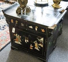 Maybe you would like to learn more about one of these? Sold Price Pair Of Asian Black Lacquer Cabinets Each Having A Pair Of Short Drawers Over Cupboard Doors With Applied Figural Decoration June 5 0118 10 00 Am Cdt