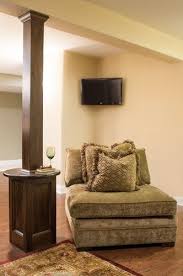 A Useful Idea For Those Unsightly Poles In Your Basement Let Us Help You Make Your Basement More Inviting Basement House Basement Remodeling Basement Renovations