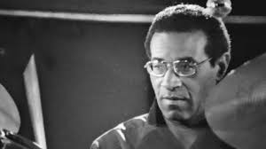 A very interesting photo I came across of King Crimson's Robert Fripp and  the great Max Roach