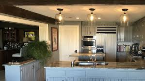 After turning off power to the room—and confirming that is indeed off—install the new mounting hardware, wire the fixture to the electrical box, and fasten the fixture before finally attaching the canopy. How High To Hang Kitchen Pendant Lights Rachael Ray Show