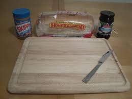 Spread peanut butter evenly onto one side of the bread using your knife. How To Make The Perfect Peanut Butter And Jelly Sandwich 6 Steps With Pictures Instructables