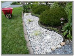 Using landscape rock is a growing trend in landscape design and an especially good one for florida landscaping. Tips On Hiring A Professional Landscaping Designer Landscaping Lovers Landscaping With Rocks Rock Garden Landscaping Stone Landscaping