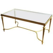 This glass coffee table with two shelves, was designed and manufactured by peter ghyczy in the netherlands in 1986. Hollywood Regency Gilt Metal Coffee Table With Glass Top From Showplace Antique Design Center Of Flatiron District New York Ny Attic