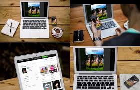 A mockup of a macbook pro standing on a wooden table with a reflective surface. 22 Free Psd Desk Mockup Designs To Showcase Your Work