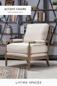 White accent chair small accent chairs accent chairs for living room formal living rooms living room furniture living room decor comfortable accent chairs buy house florida design. Spindle Arm Accent Chair Upholstered In A Neutral Tone And Accented By Weathered Oak Wood Features Living Room Chairs Farmhouse Interior Furniture